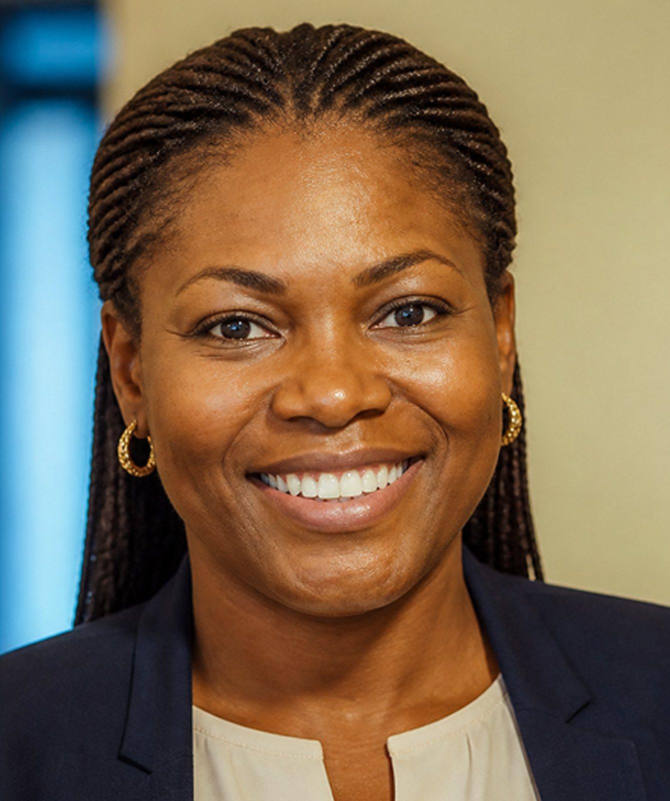 Smiling woman in a navy blazer